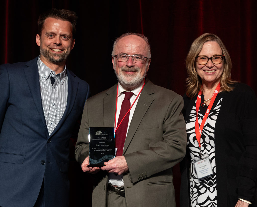 2025 Lifetime Achievement Award presented to Paul Mackey by Dr. Martin Lavallière, the Conference Chair on behalf of the sponsor of the award, Accident Support Services International.